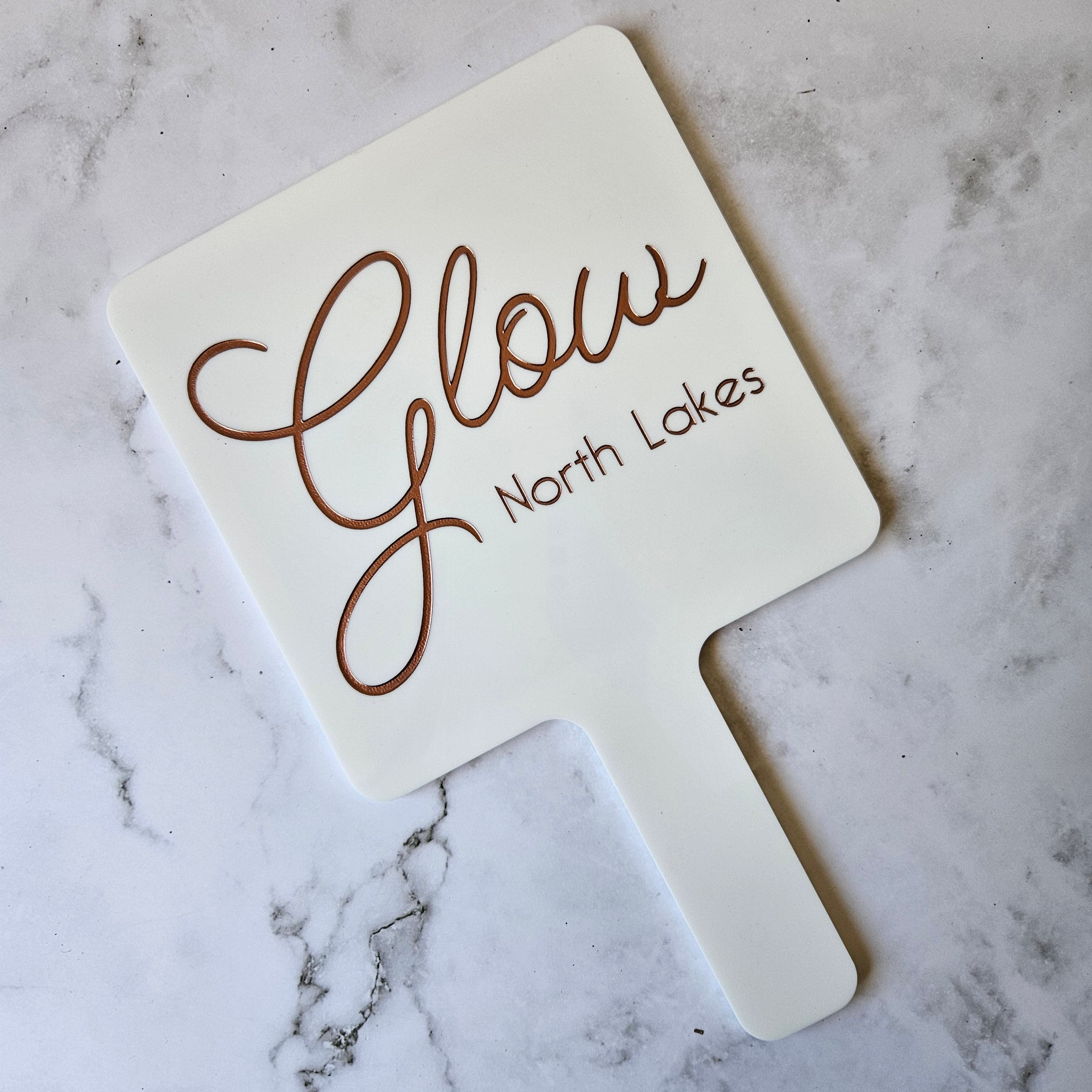 Custom Handheld Mirror with Logo for Glow North Lakes Beauty Salon - Square handheld mirror in white acrylic with Metallic Rose Gold logo
