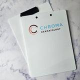 Branded clipboard in white with logo