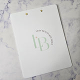 Clipboard with logo in green