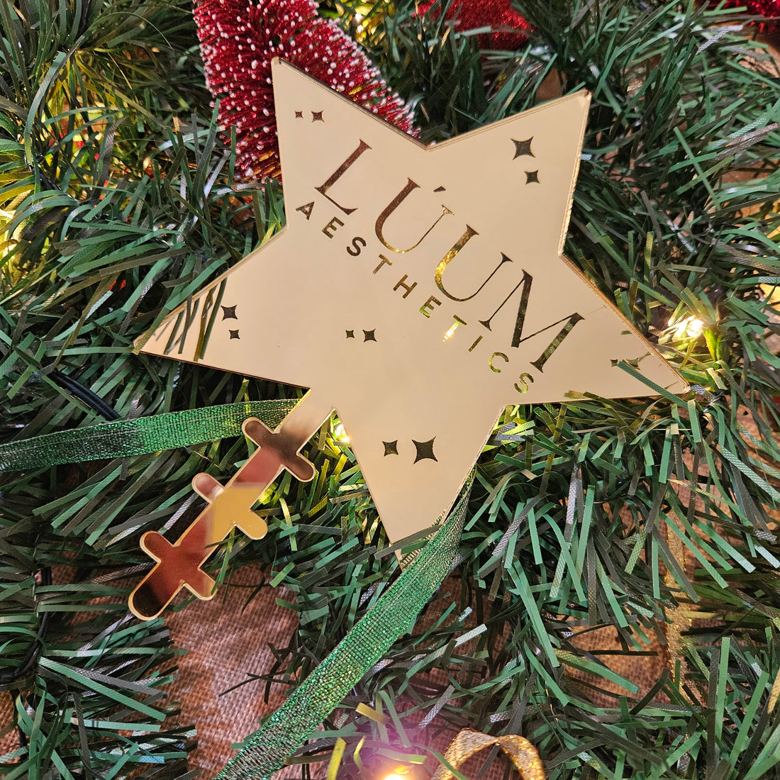 Branded Christmas Star with Cosmetic Clinic Logo in Gold Mirror Acrylic