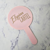 Round Custom Handheld Mirror with Gold Engraved Logo and Baby Pink Acrylic