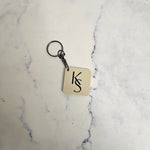 Logo keyring with square shape