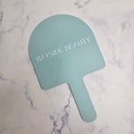 Handheld mirror with logo