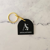 QR Code Keyring in arch shape with white logo on black acrylic