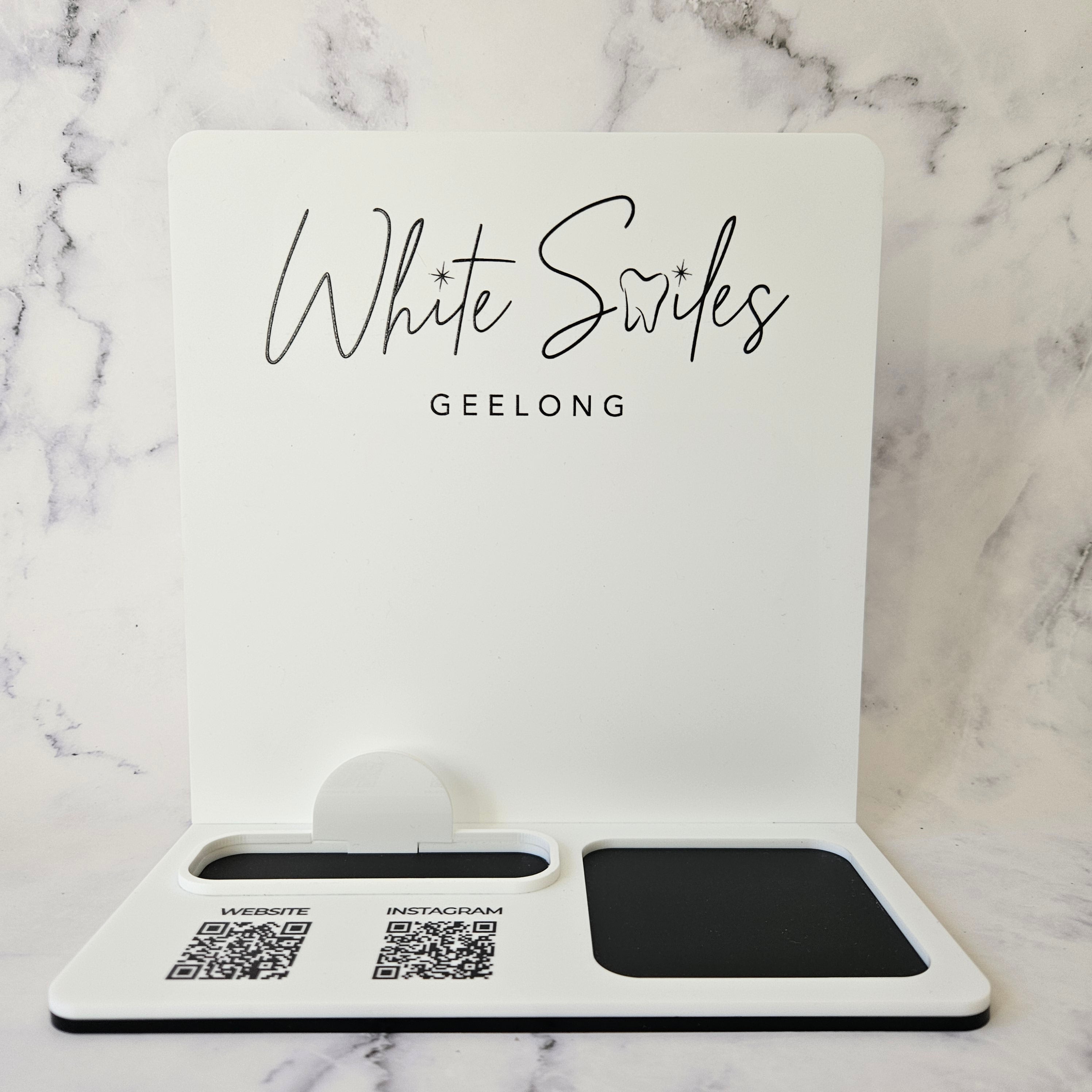 square reader dock in a rectangle shape with logo and qr codes